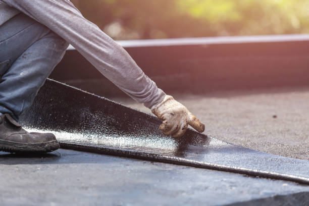 Professional Basement Waterproofing technician working in Ridgefield, NJ